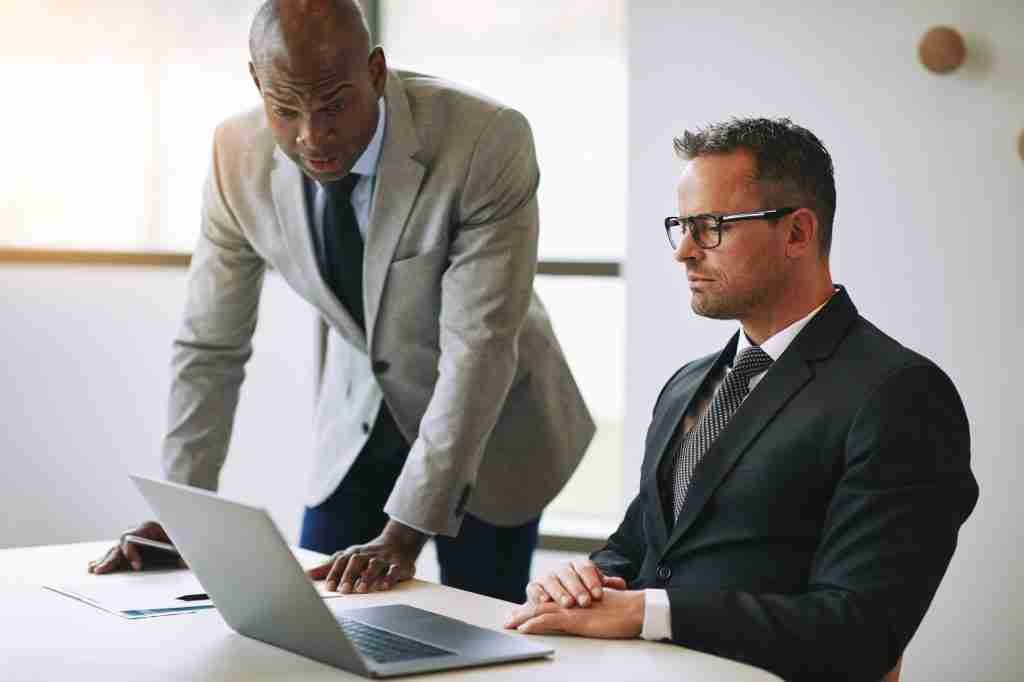 two diverse businessmen discussing work together a X9LDZYS The Credit Dispute Center